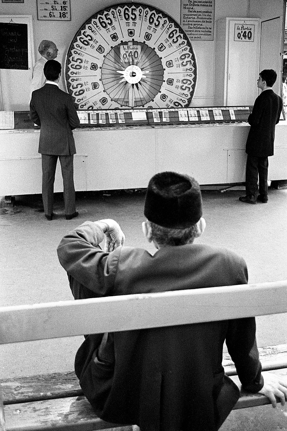 Vintage Street black and white film photography Paris Wheel Lottery Game c1970