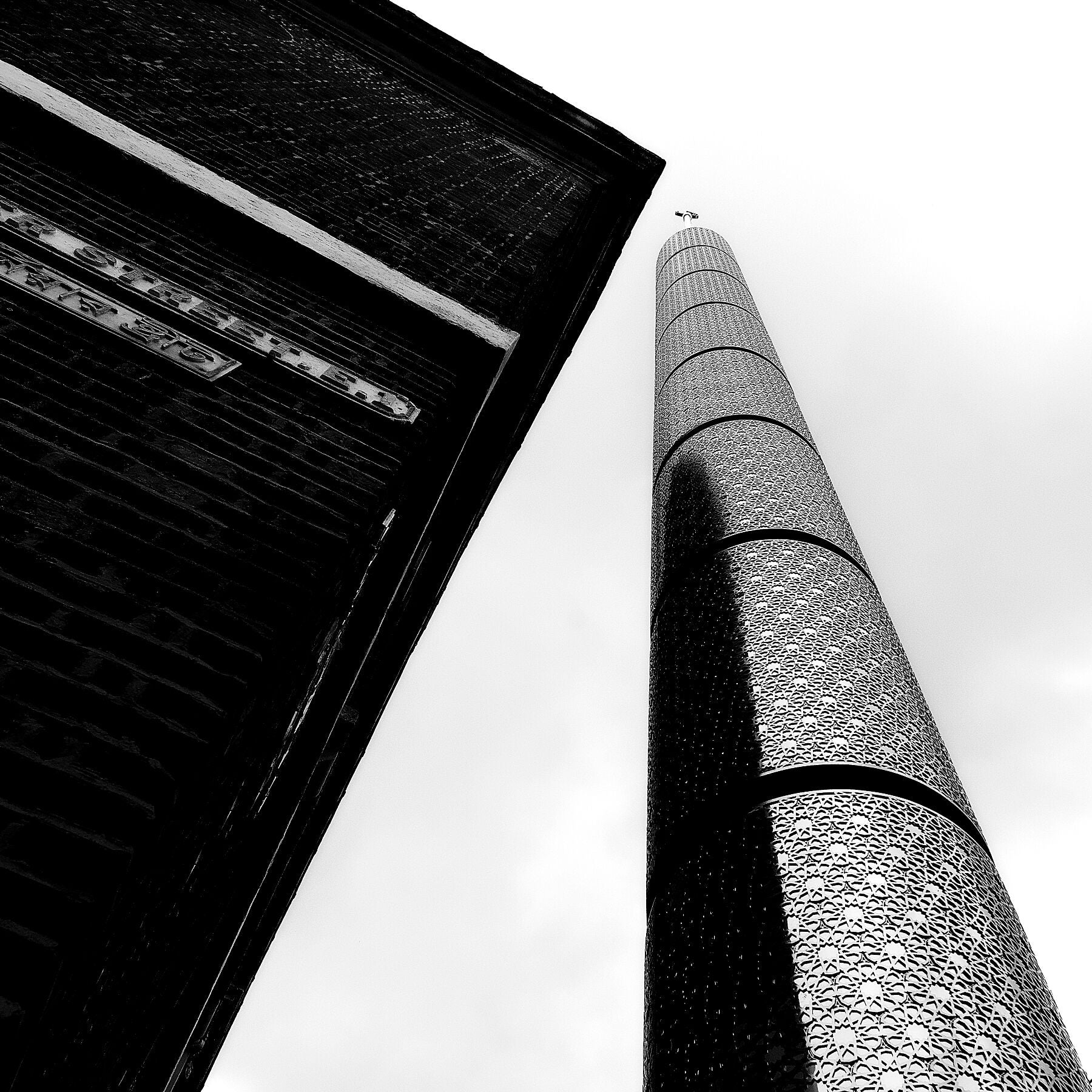 Black and white architectural photography,  Stainless Steel Tower, Brick Lane, London