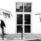 Paris, France. Man, 2 dogs, 2 hands. From Eric Schneider's 'Street' photography series. Black and white photography wall art for homes, offices, hospitals, hotels, restaurants bars and cafes. An extensive collection for collectors, art buyers, interior designers and individuals.